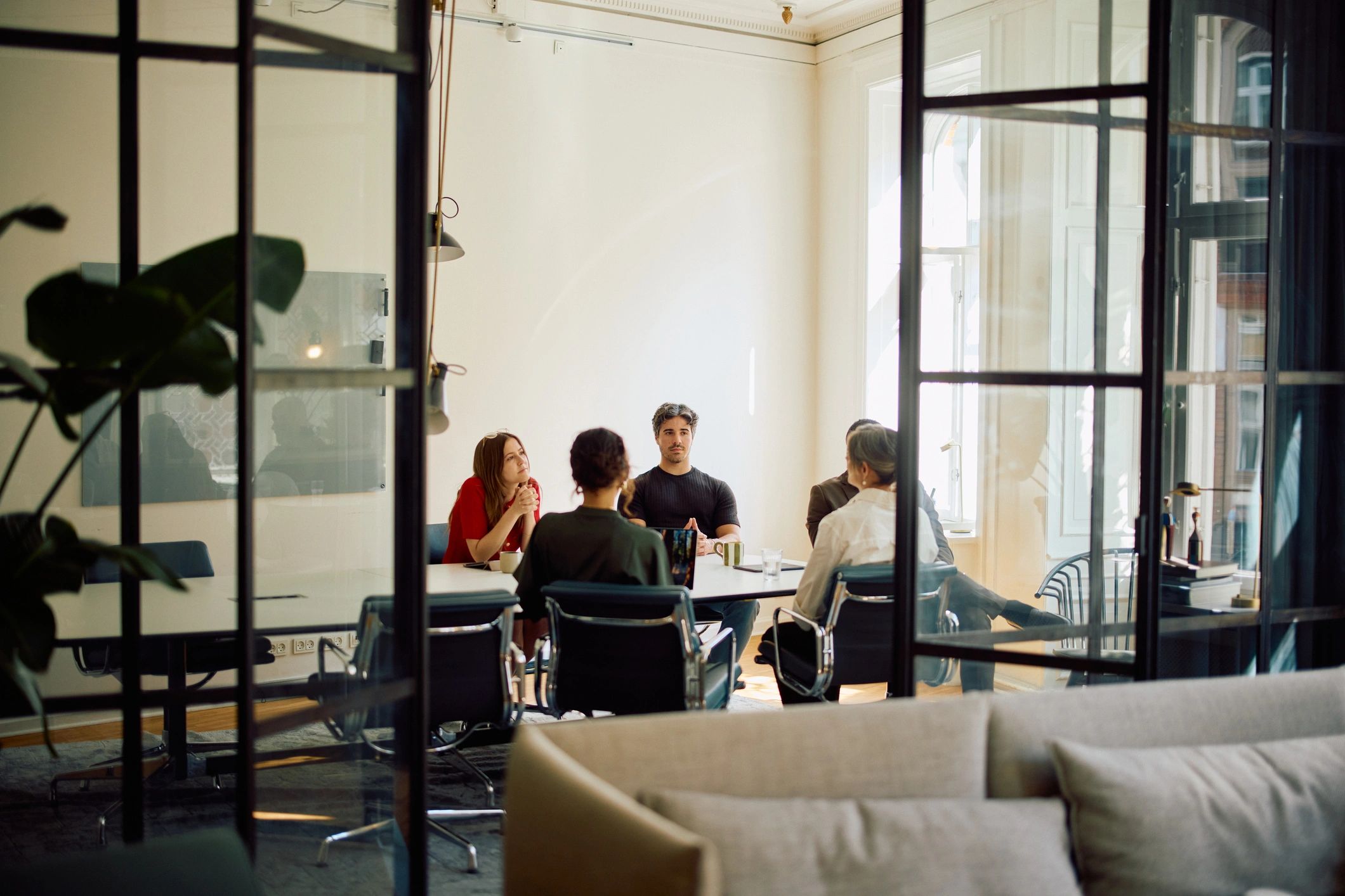 Business professionals collaborating in a bright office