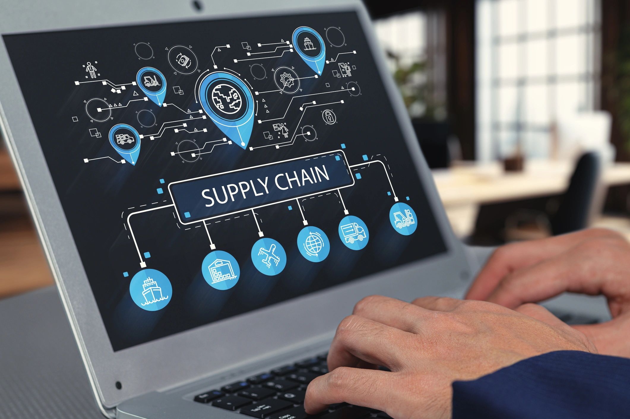 Supply chain software dashboard displayed on a laptop screen